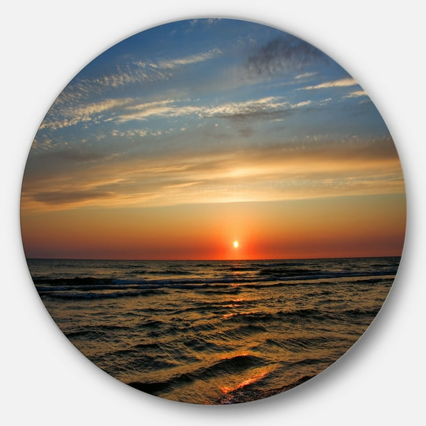 Designart 'Red Sunset with Dark Ocean Waves' Seascape Metal Circle Wall