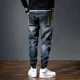thumbnail image 4 of Pantalones vaqueros elásticos para hombre, pantalones vaqueros elásticos con empalmes, ajustados, abotonados, ajustados, estilo coreano, Harajuku, 4 of 5