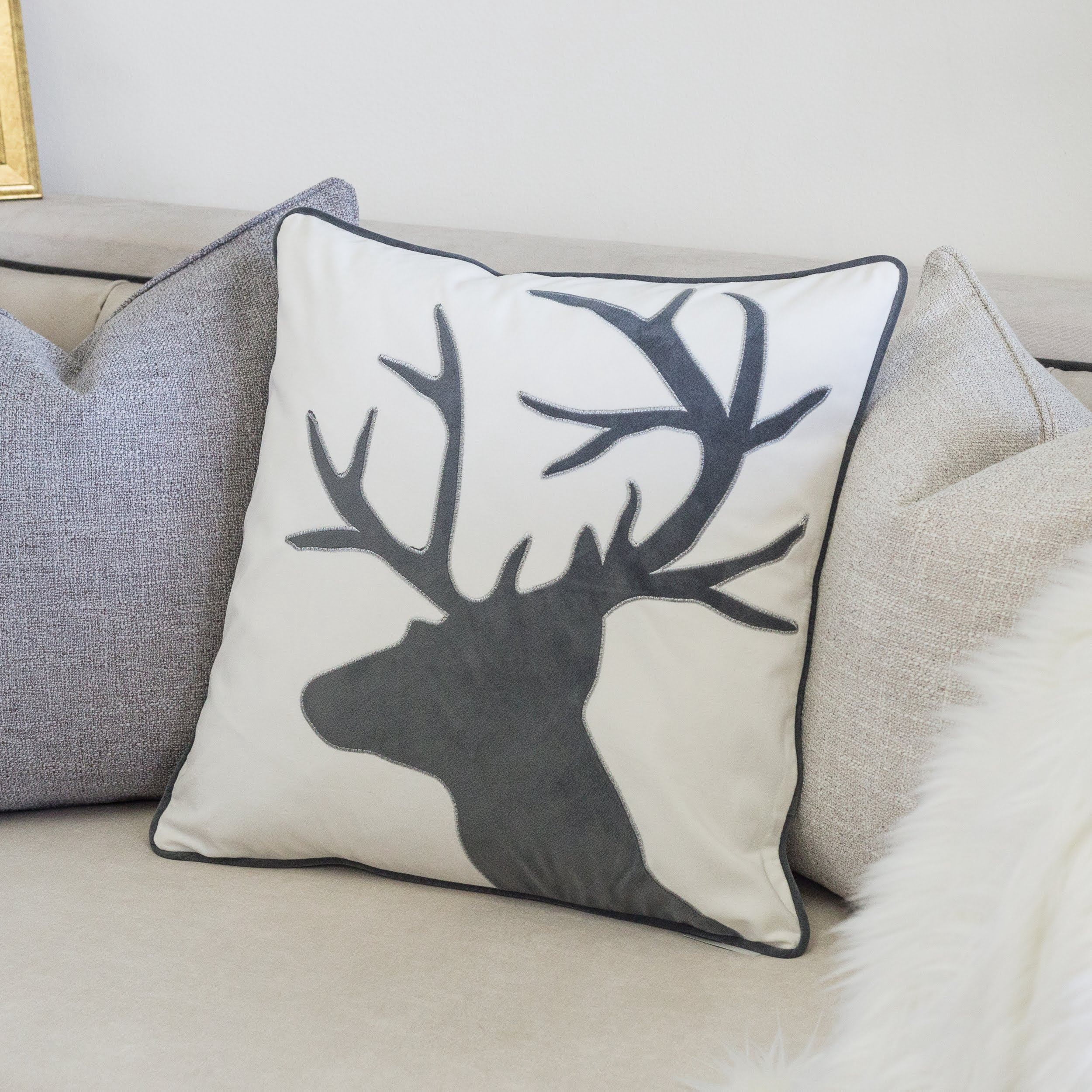 Reindeer White Animal Print Polyester 20 in. x 20 in. Throw Pillow