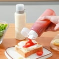thumbnail image 4 of Bouteille en Plastique Transparent pour Sauces et Condiments avec Buse Réglable, Distributeur de Cuisine pour Huile, Vinaigre, Ketchup, Usage Domestique et Restaurant Hzhnb / Pp, Blanc, 4 of 9