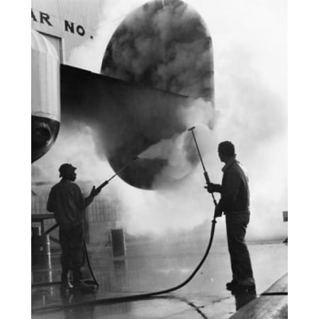 Steam Manual - Manual workers cleaning airplane with steam Stretched Canvas - (24 x 36)