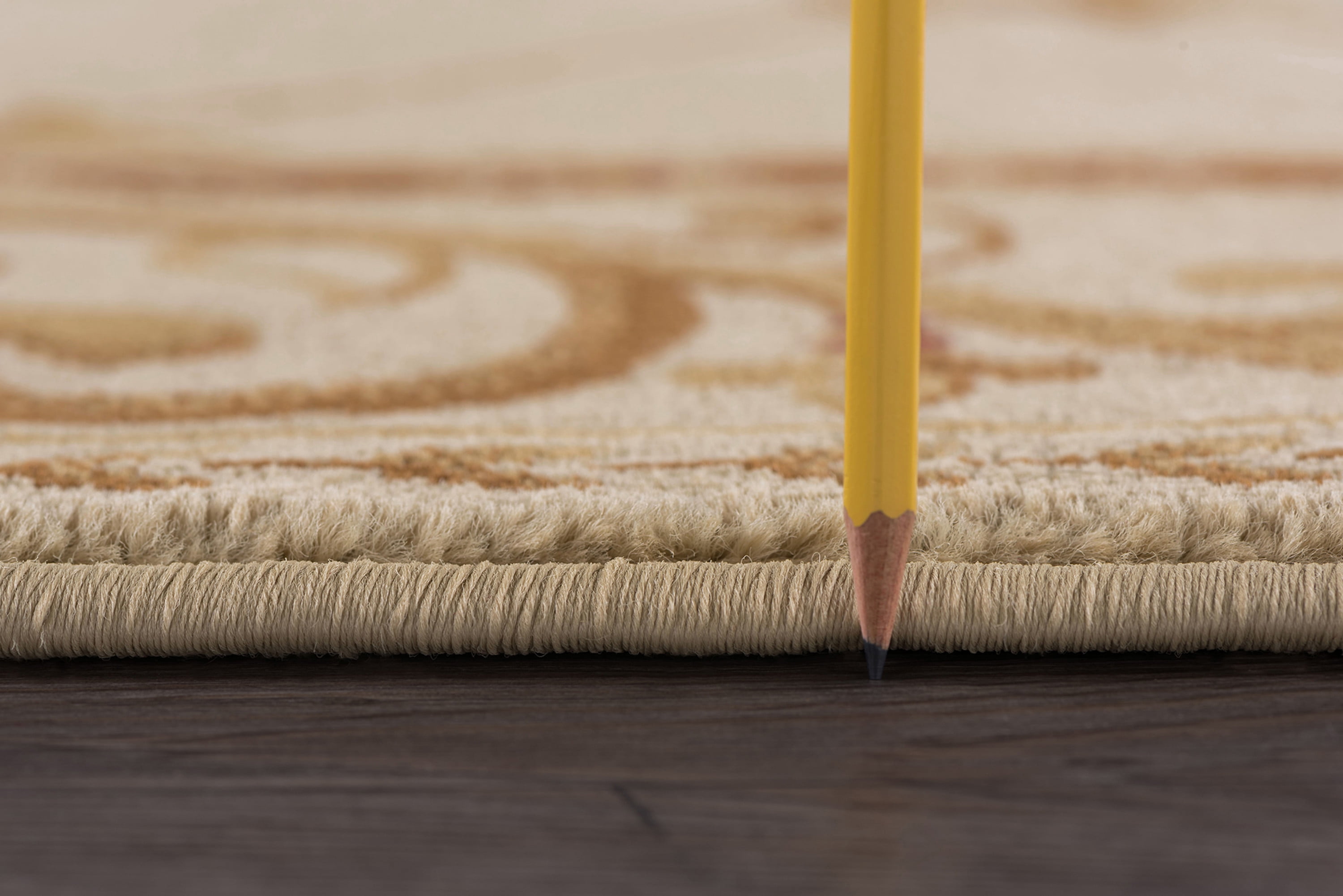 Sensation Traditional 5' x 7' Ivory and Beige Polypropylene Indoor Area Rug