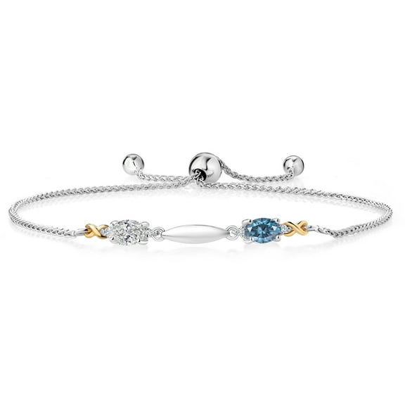 Gem Stone King 925 Silver and 10K Yellow Gold Lab Grown Diamond and Persian Blue Moissanite Bracelet for Women | 0.89 Cttw | Gemstone April Birthstone | Oval 6X4MM | Fully Adjustable 9"