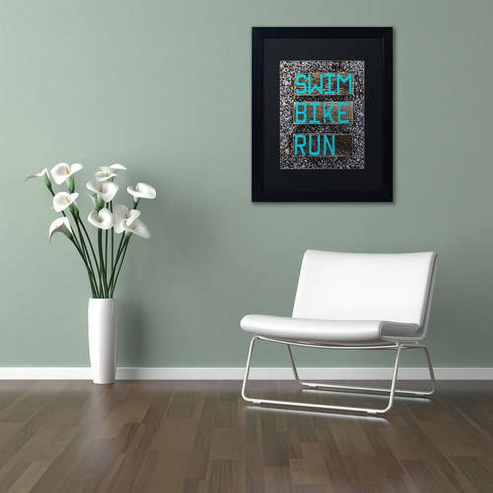 Trademark Fine Art 'The Triathlete' Canvas Art by Nicole Dietz, Black Matte, Black Frame
