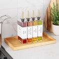 thumbnail image 3 of 4 Pack 12 Oz Gold Cooking Oil Dispenser Set, Elegant Book Design Olive Oil Vinegar Soy Sauce Bottles, Leak Proof Easy Pour Spout Kitchen Condiment Container, 3 of 5