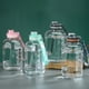 thumbnail image 1 of Garrafa de agua de gran capacidad 2200ML | Botella deportiva de plástico con asa | Vaso espacial impermeable, antideslizante esmerilado, cuerda portátil, reutilizable para exteriores, separador de, 1 of 9