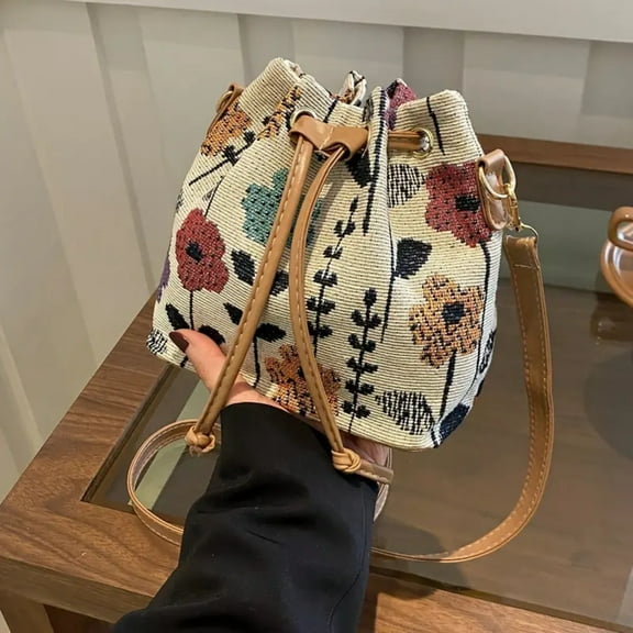 Ladies' elegant floral pattern bucket bag: A handbag with ethnic style, featuring a zipper closure. Suitable for both travel and work, it can be used as a crossbody bag for outdoor leisure commuting