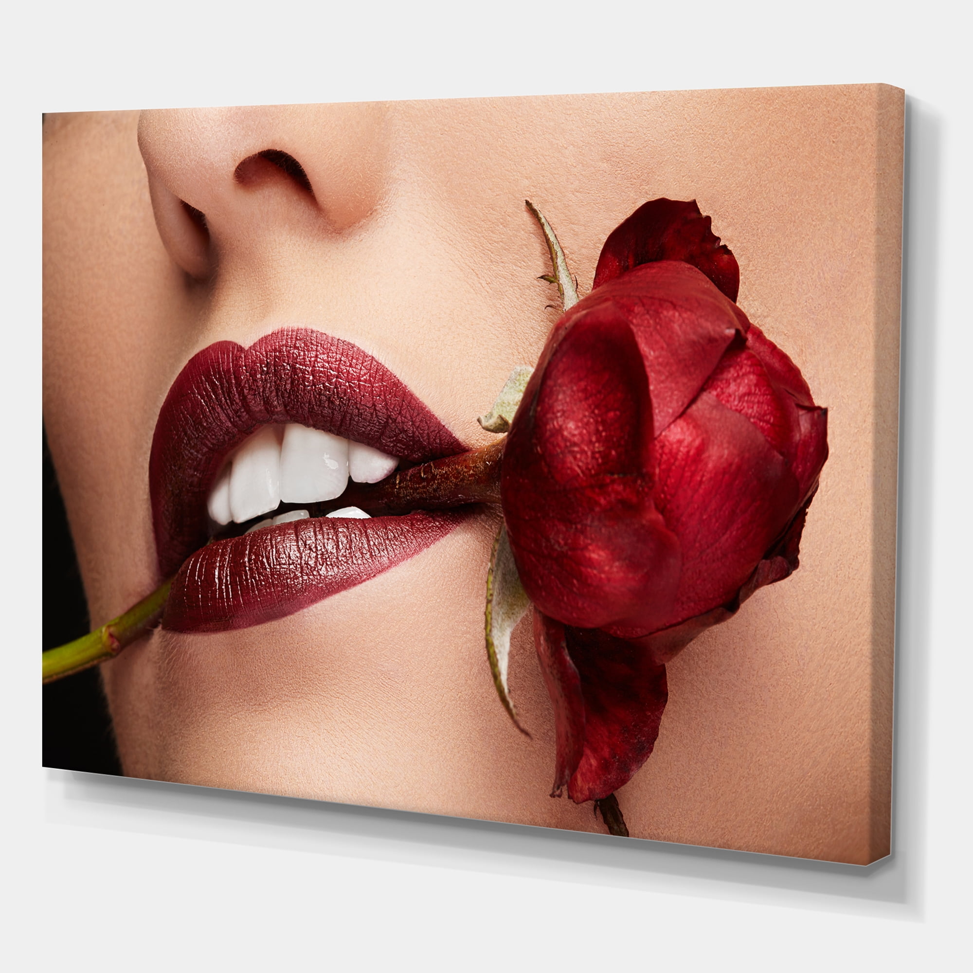 Designart ' Girl With Red Lipstick Holding A Rose In Mouth ' Modern Canvas Wall Art Print