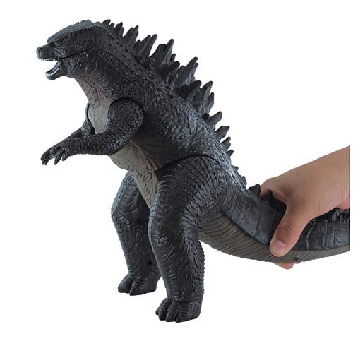 godzilla toy with blue fire