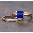 thumbnail image 1 of 1.75 Carat Blue Sapphire 6mm Princess Cut And Moissanite Diamond Halo Bridal Set in 10k Rose Gold, 1 of 4