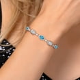 thumbnail image 4 of Gem Stone King 925 Sterling Silver American Blue Mystic Topaz and White Lab Grown Diamond Bracelet for Women | 4.40 Cttw | Gemstone November Birthstone | Oval 7X5MM | Fully Adjustable 9 inch, 4 of 6