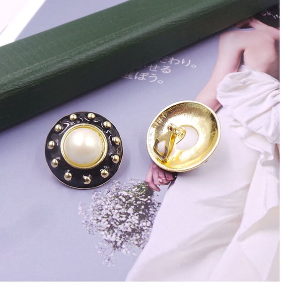 Clip on 1" gold bead and black round earrings with center pearl