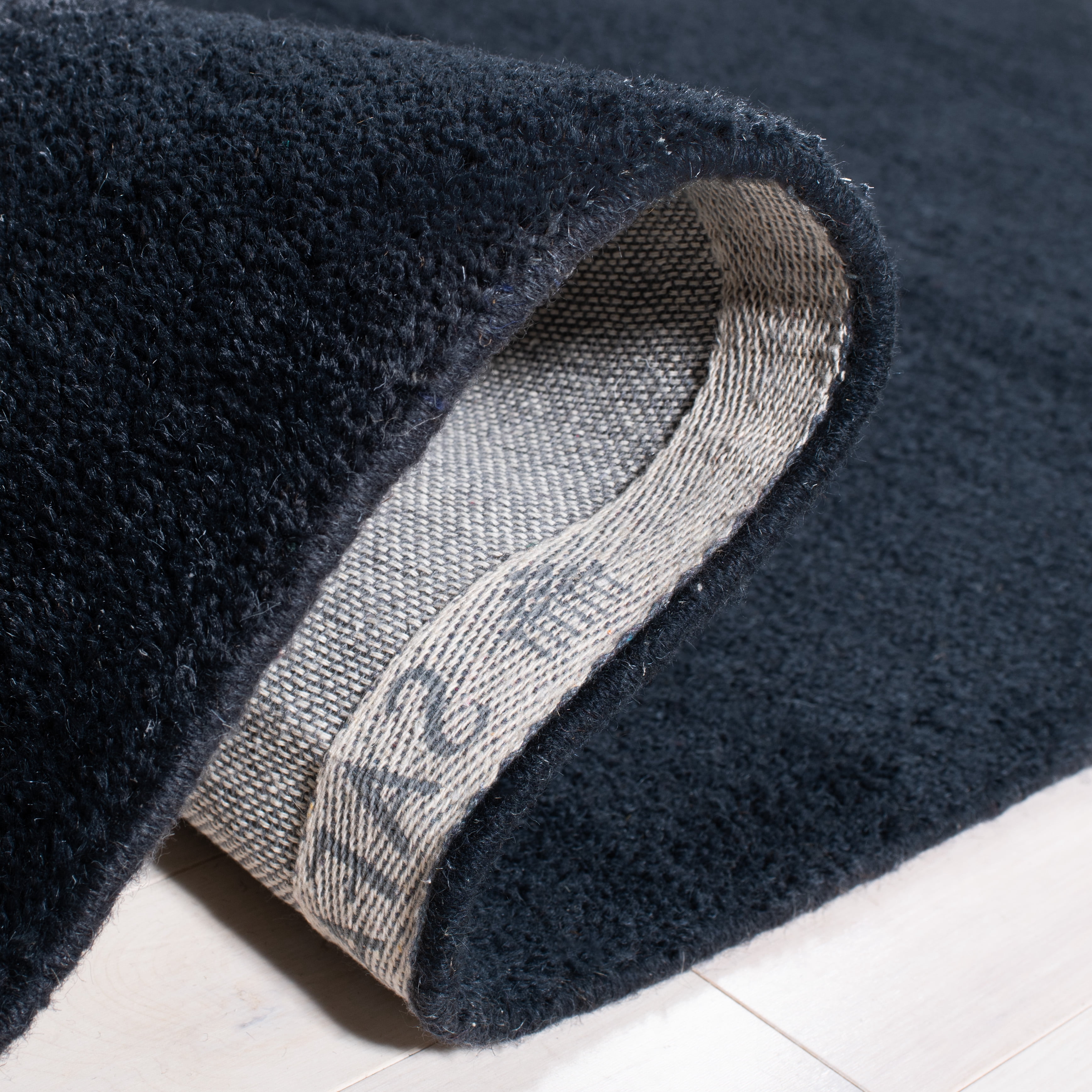 SAFAVIEH Himalaya Rachelle Solid Wool Runner Rug, Black, 2'3" x 18'