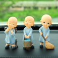 thumbnail image 1 of Figuras de acción de monjes budista, adornos de coche, decoración de monje, salpicadero Interior automotriz, accesorios de Voiture, regalos para niños, 1 of 3