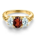 thumbnail image 3 of Gem Stone King 18K Yellow Gold Plated Silver Red Garnet and Sky Blue Aquamarine Filigree Style 3 Stone Ring for Women (2.50 Cttw, Oval 8X6MM and 6X4MM, Size 8) (Size 8), 3 of 6