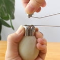 thumbnail image 1 of Leylor Abridor de cáscara de huevo: herramienta de cocina eficiente para abridor de cáscara de huevo de acero inoxidable(L), 1 of 5