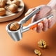 thumbnail image 5 of Pinza de aleación para nueces y cascanueces con palillo | Alicates resistentes para nueces, pecanas, avellanas y almendras | Mango ergonómico de metal con diseño de embudo | Incluye palillo para, 5 of 7