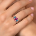 thumbnail image 4 of Gem Stone King 18K Rose Gold Plated Silver Pink Created Sapphire and London Blue Topaz Filigree Style 3 Stone Ring for Women (2.85 Cttw, Oval 8X6MM and 6X4MM) (Size 9), 4 of 6