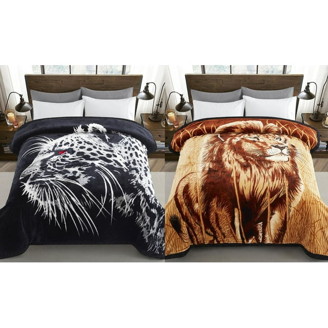 Oversized reversible plush fleece throw blanket featuring a black and white leopard design with red eyes on one side and a brown lion illustration in tall grass on the other, shown spread over a bed.