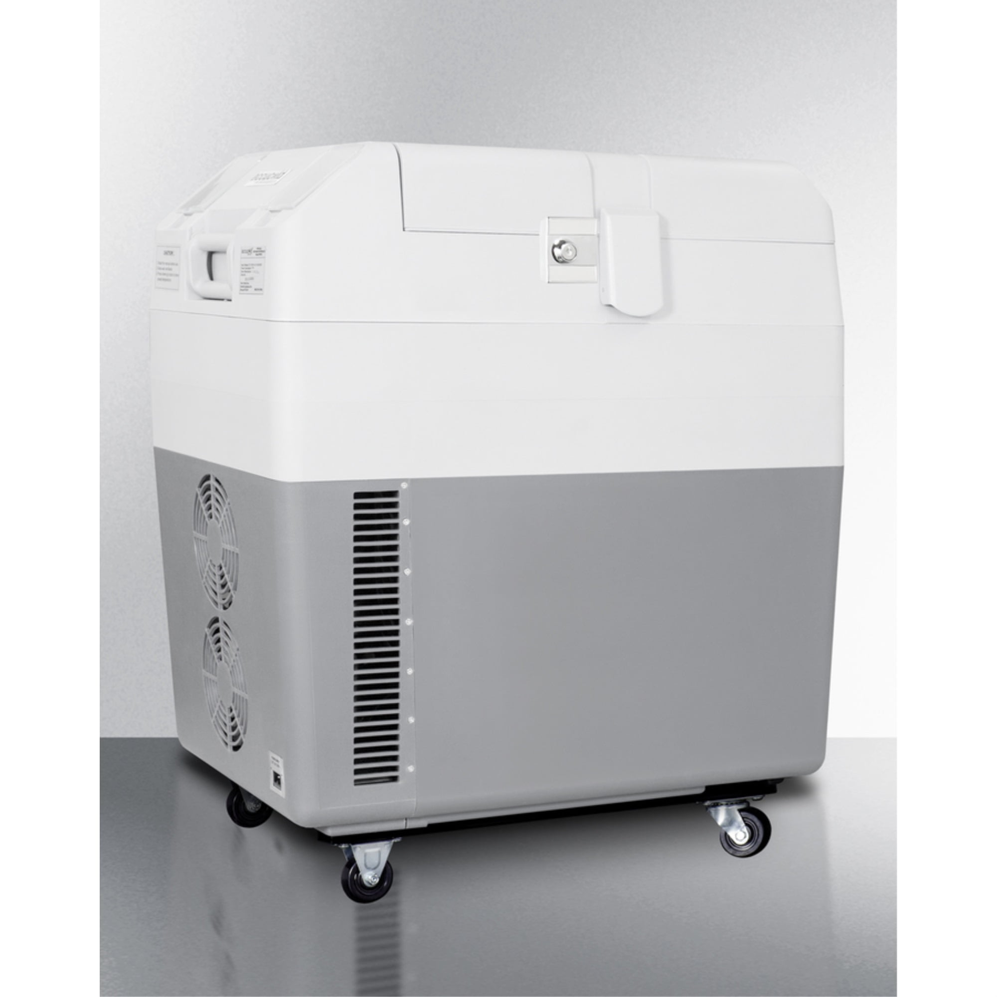 Portable 12V/24V medical cooler capable of operating at -12C or standard refrigerator temperatures, with lock and factory-installed wheels