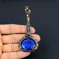 thumbnail image 2 of Natural Guitar Lapis Lazuli Gemstone Handmade Copper Wire Wrap Pendant 4.33, 2 of 4