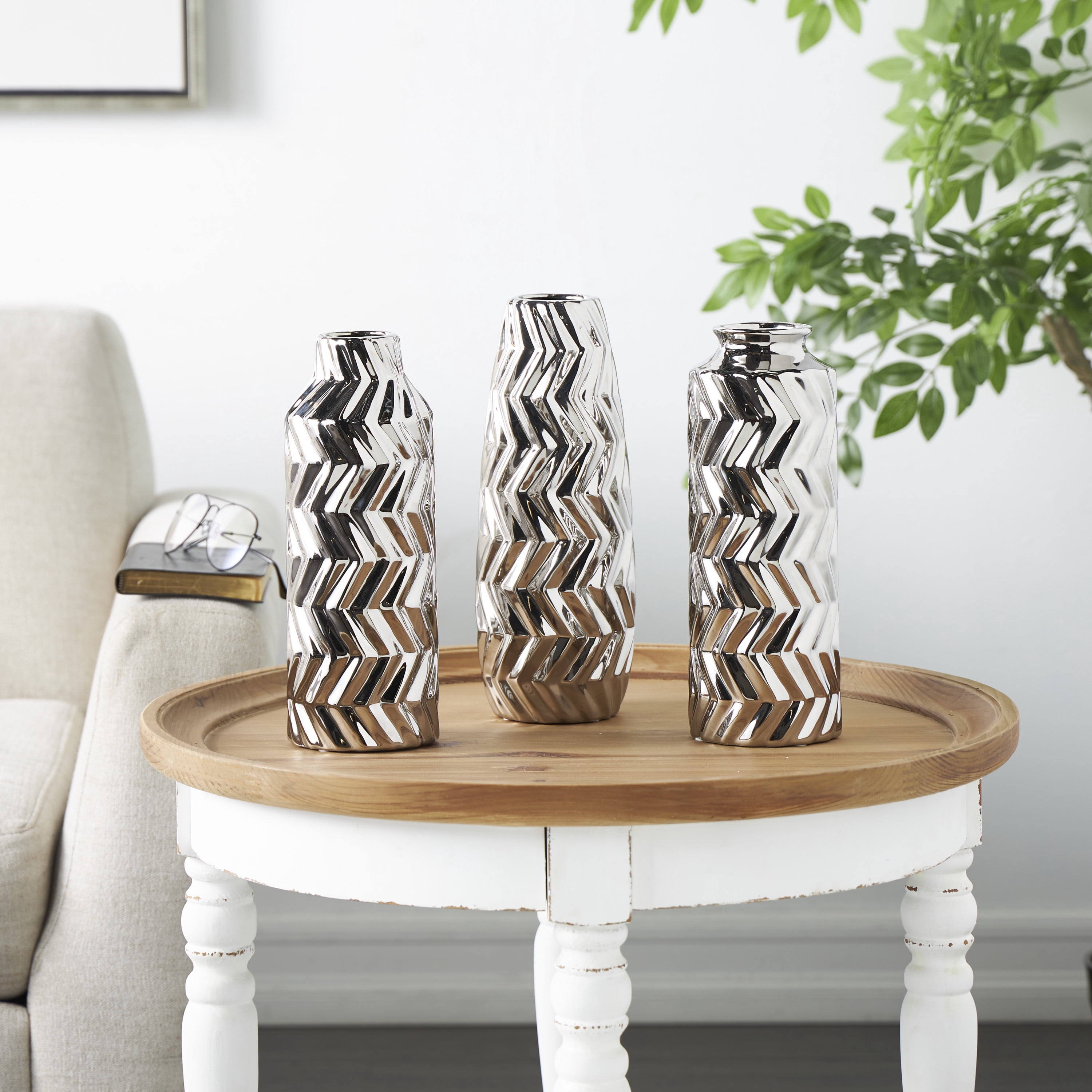 DecMode 4"W, 11"H Dimensional Chevron Textured Silver Ceramic Vase with Varying Shapes, Set of 3