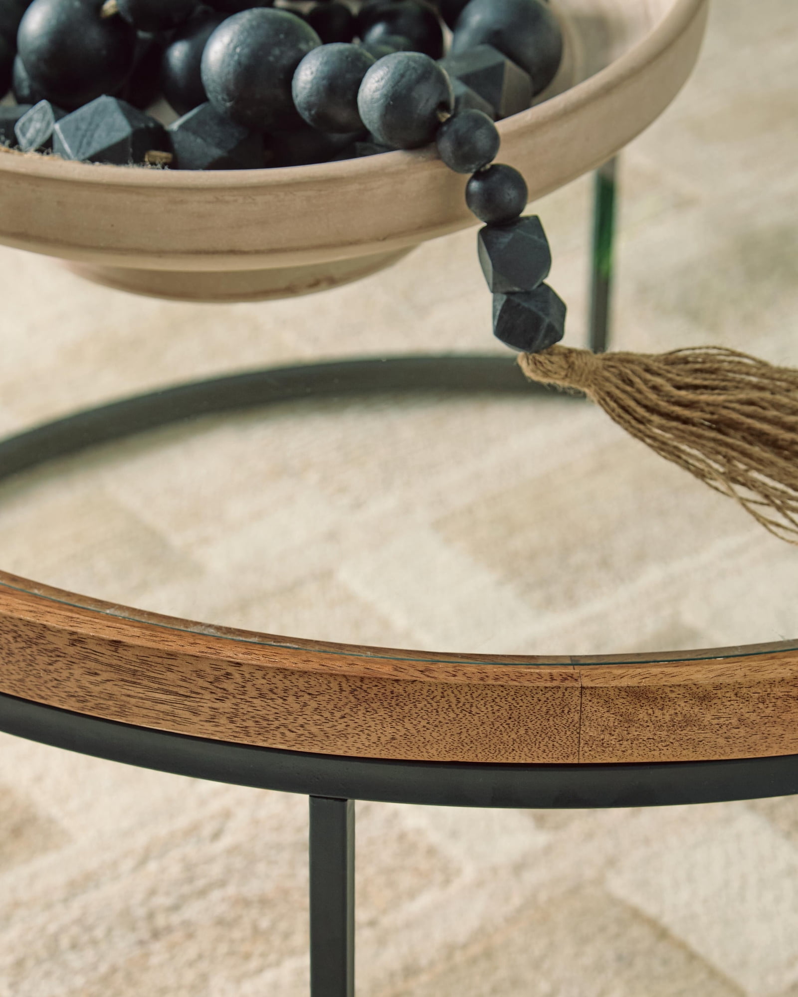 Signature Design By Ashley Noraluna Round Cocktail Table in Medium Brown/Black