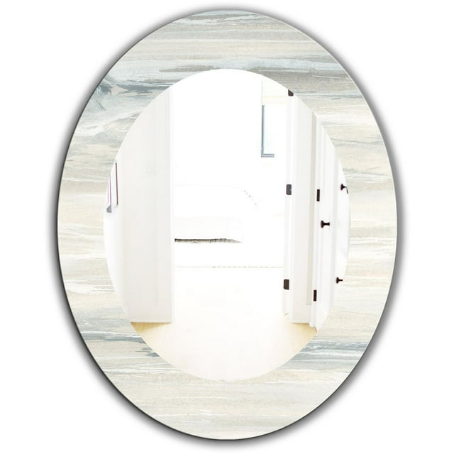 Oval modern wall mirror featuring a watercolor colorfields style frame in muted gray and beige hues, reflecting a bright interior hallway.