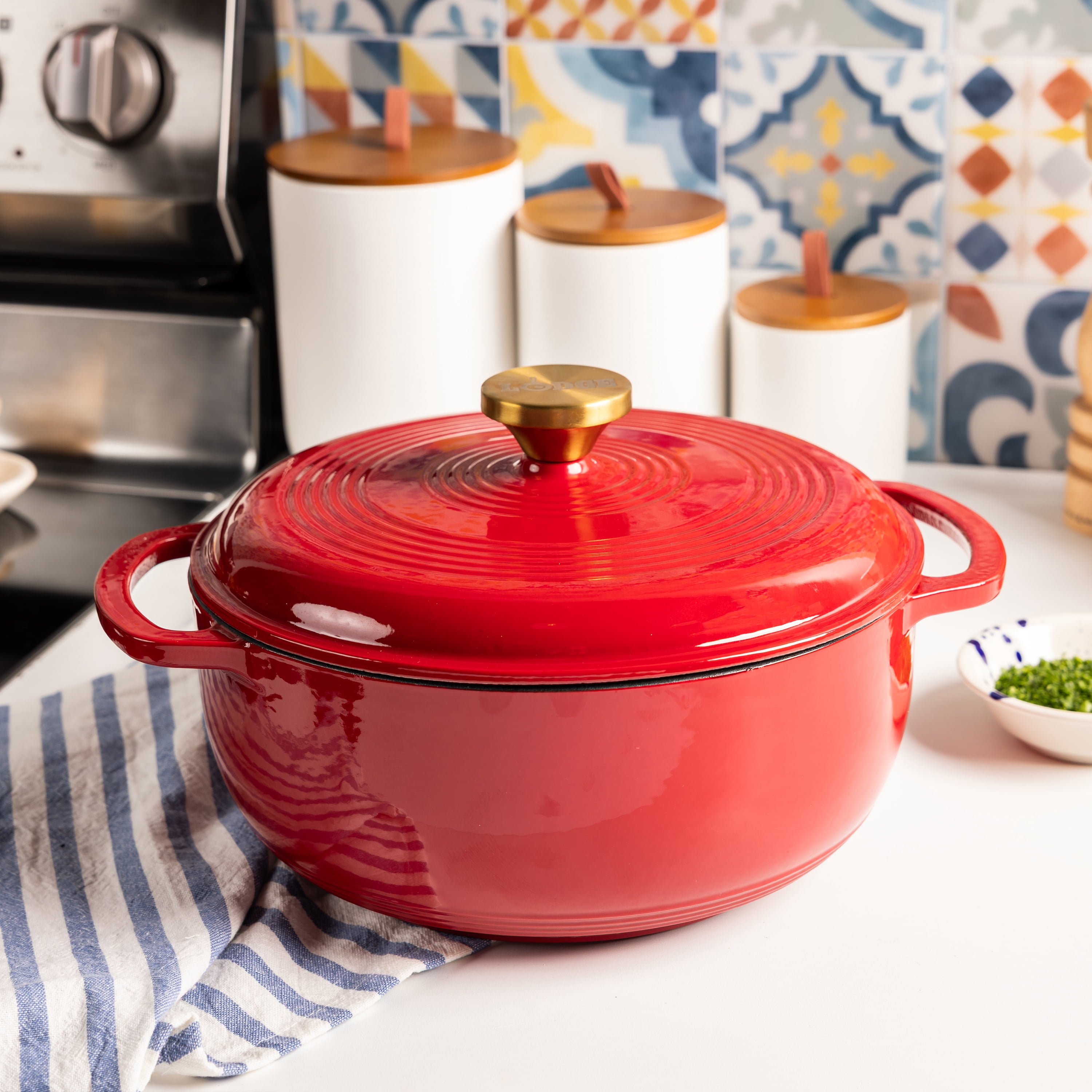 Lodge 4.5 Quart Enameled Cast Iron Dutch Oven with Lid – Dual Handles – Oven Safe up to 500° F or on Stovetop - Use to Marinate, Cook, Bake, Refrigerate and Serve – Ruby with Gold Knob
