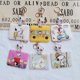 thumbnail image 2 of Llavero con colgante para tarjetas, funda protectora antipérdida, diseño de dibujos animados, de Snoopy, Charlie Brown y Peanuts, 2 of 5