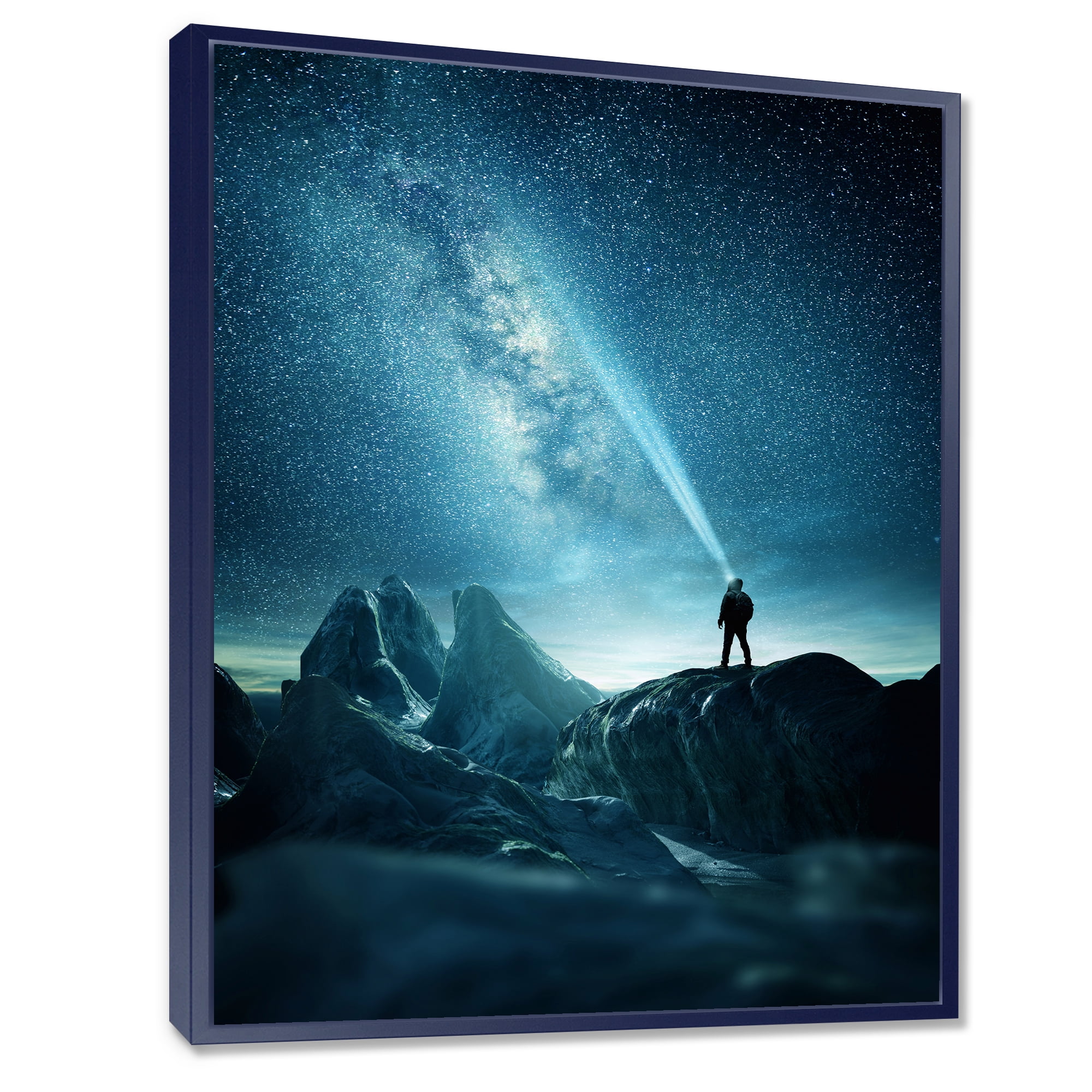 Designart 'A Light Shining by A Man Shining Into The Night Sky' Modern Framed Canvas Wall Art Print