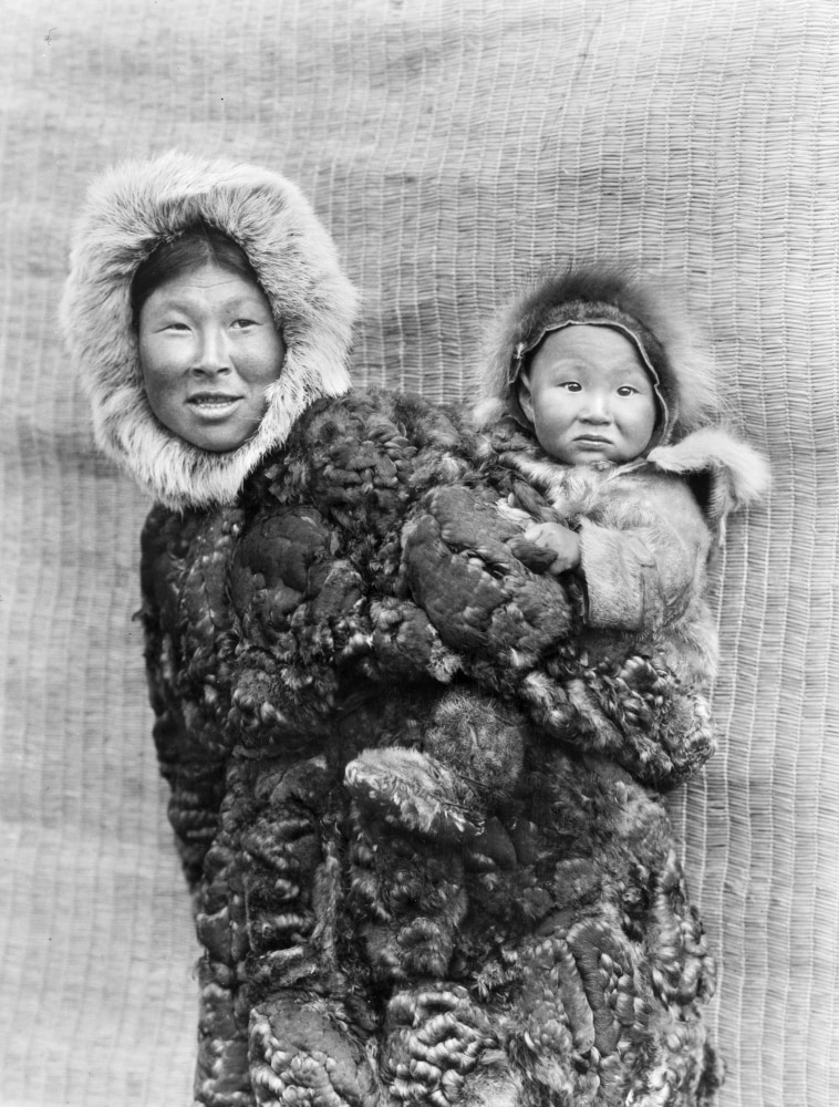 Alaska Eskimos, C1929. /Nan Eskimo Mother Carrying A Child, Identified