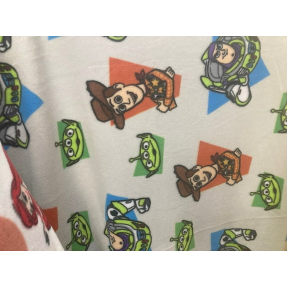Lilly Craft Woody and Buzz Fleece Fabric is Cut and Sold by the Yard 100% Polyester and is 58” / 60” Wide