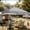 Grey, variant on Heavy Duty 10 Foot by 10 Foot Pop Up Canopy Tent with One Person Easy Setup System and Rolling Wheeled Carry Bag for Outdoor Camping Beach and Market Events