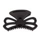 thumbnail image 1 of ¡CARAVAN®! ELEGANTE LAZO DOBLE ATADO EN UNA PINZA EN NEGRO PARA EL CABELLO, 1 of 2