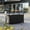 Black, variant on Outdoor Rolling Wicker Bar Cart, Large Portable Outdoor Wicker Bar Table with Cabinet Storage and Glass Countertop, Patio Wicker Serving Bar Cart for Pool, Party, Backyard, Black