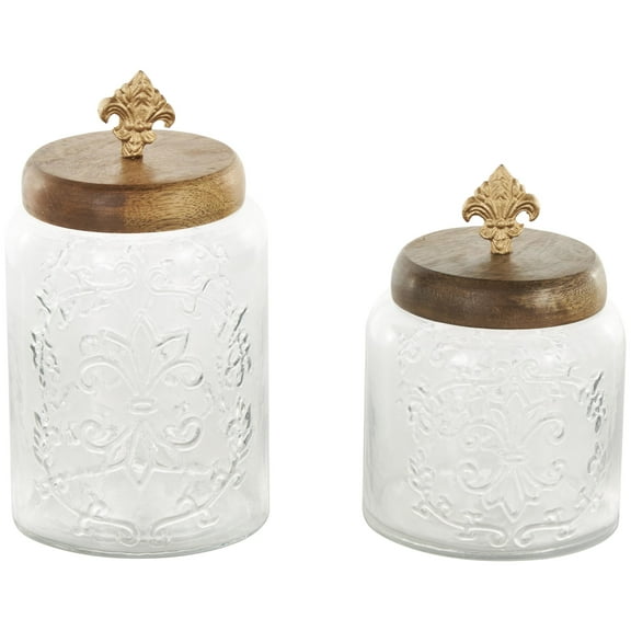 DecMode 9", 7"H Clear Glass Scroll Decorative Jars with Brown Wooden Lids and Gold Fleur-De- Lis Knobs, 2-Pieces