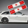 thumbnail image 1 of Emblema de la bandera de Canadá Pegatina de metal para coche | Insignia de aleación y epoxi autoadhesiva | Decoración y protección de estilo de coche DIY | Fácil de pelar y pegar | 56x13 mm | Juego, 1 of 2