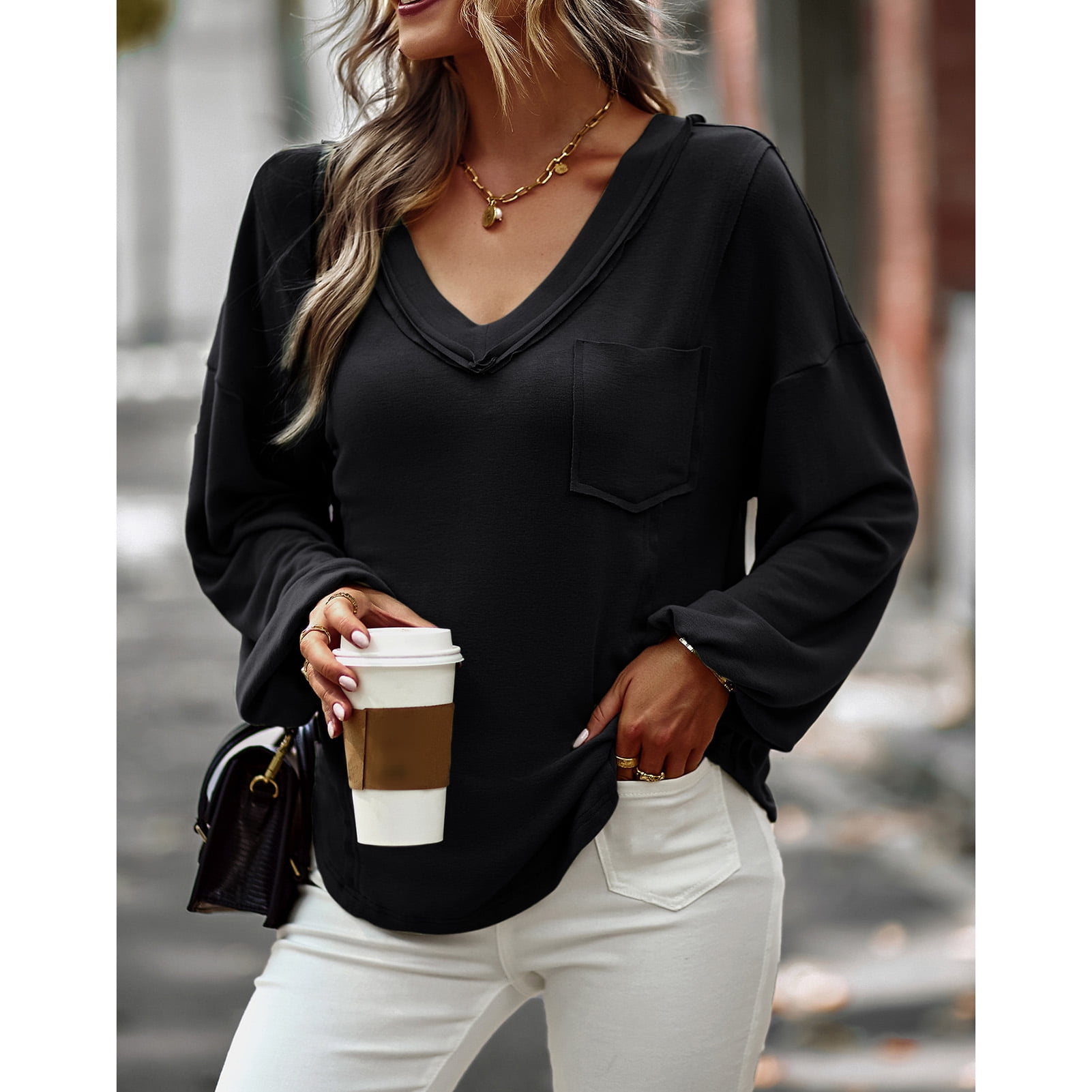 blusa negra manga larga cuello v