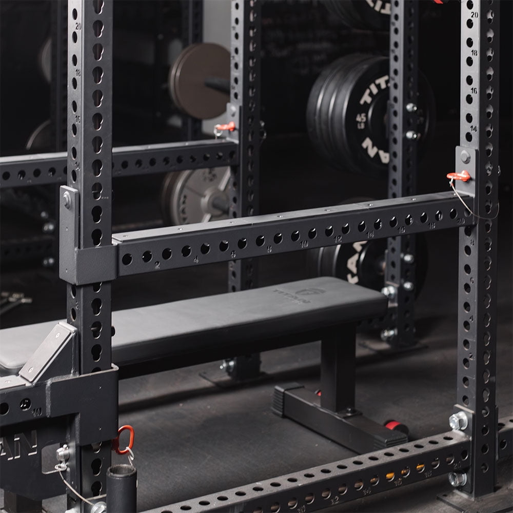 Titan Fitness TITAN Series Flip-Down Safety Bars, 36" Depth Spotter Arms, Rated 3,000 LB, Safety Bars for 3"x3" Uprights with Plastic Liner Protection, Spotter Arms for Squat Rack