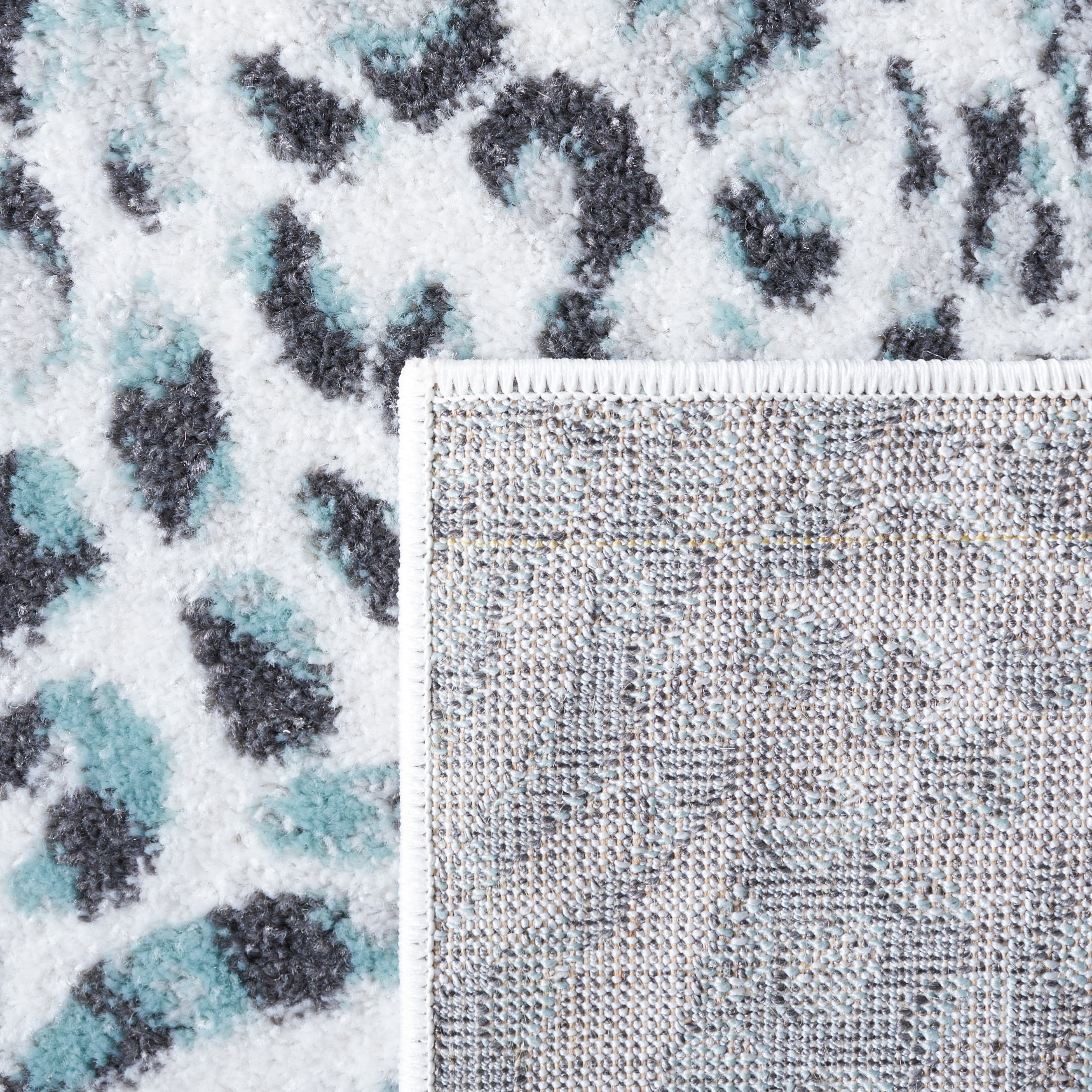 SAFAVIEH Amsterdam Ruby Animal Area Rug, Ivory/Teal, 6'7" x 9'2"