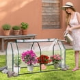 thumbnail image 2 of Costway 47" x 22" x 24" Portable Mini Greenhouse with 2 Zipper Doors & Ground Stakes Clear, 2 of 8