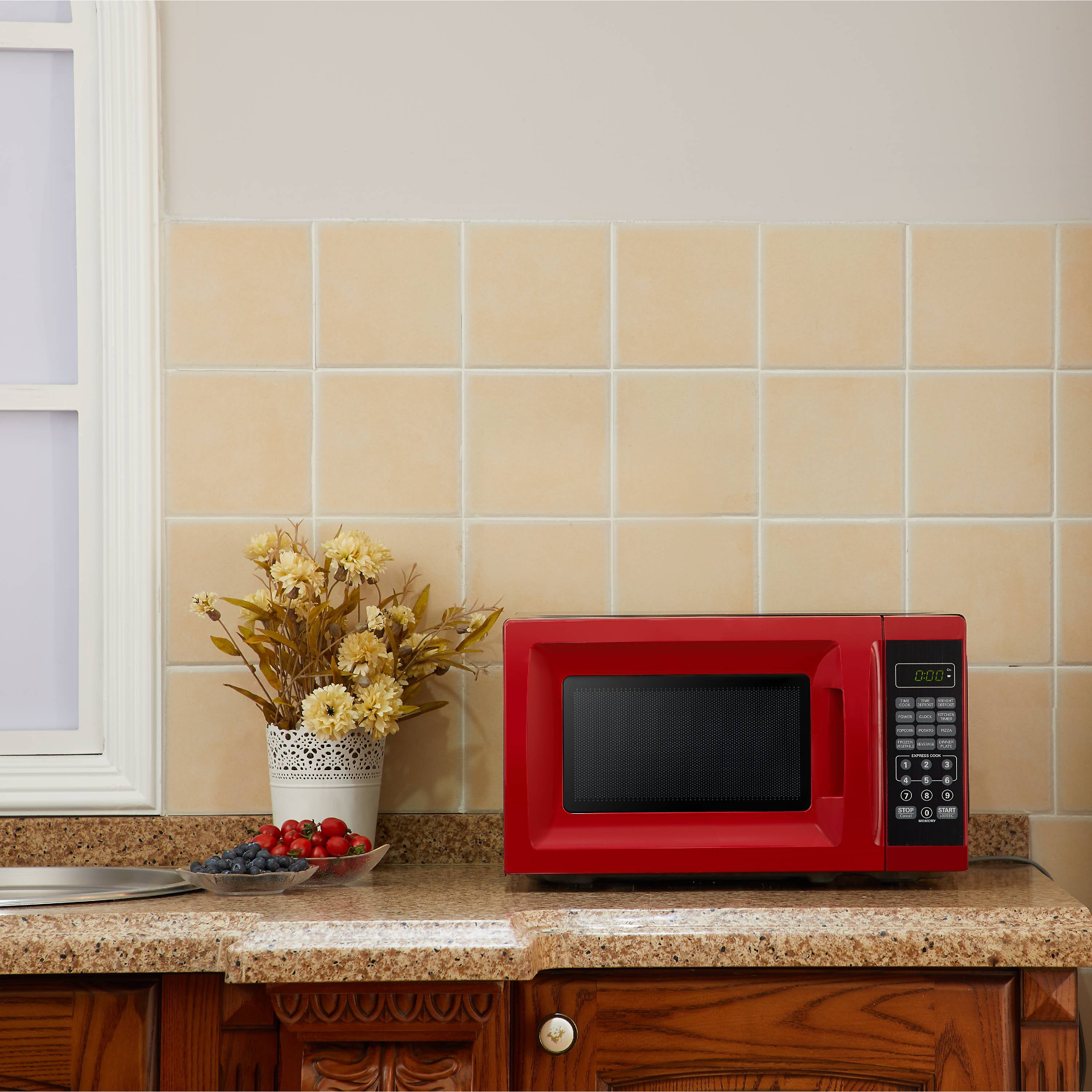 Mainstays 0.7 Cu ft Compact Countertop Microwave Oven, Red