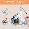 thumbnail image 3 of Rotating acrylic display showcasing a pelican skimming water with sandy shores and blue sea lavender in vibrant, detailed colors against a pure white background, 3 of 6