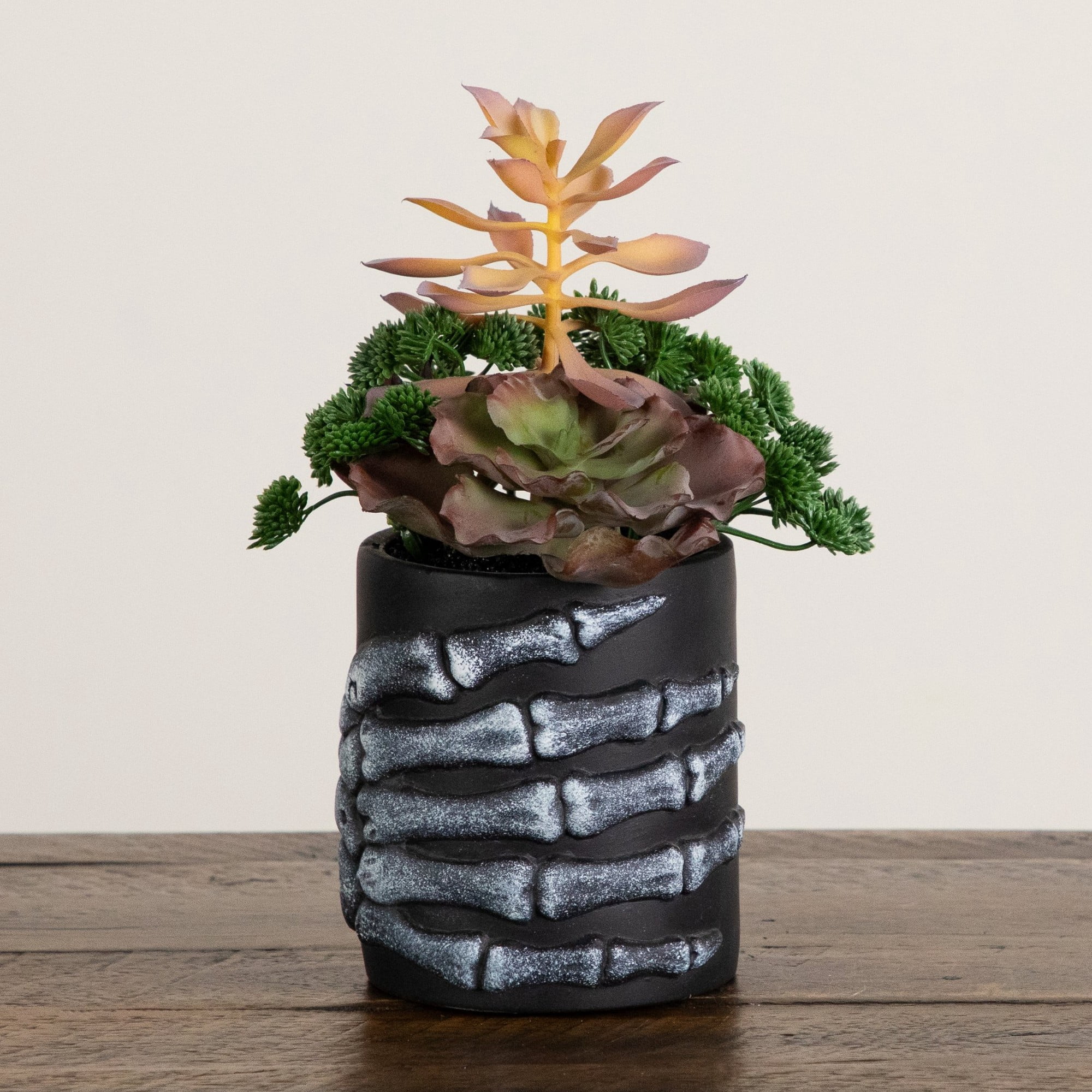 9in. Artificial Halloween Succulent Garden in Skeleton Hand Planter