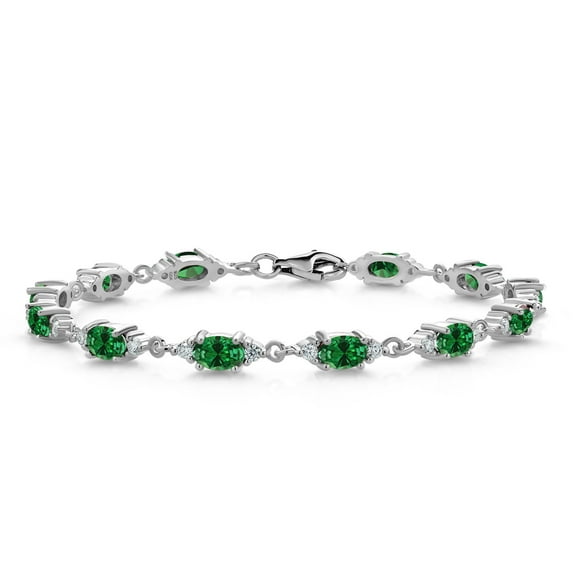 Gem Stone King 925 Sterling Silver Green Created Emerald and White Moissanite Tennis Bracelet for Women (5.11 Cttw, Gemstone Birthstone, Oval 6X4MM, 7 inch)
