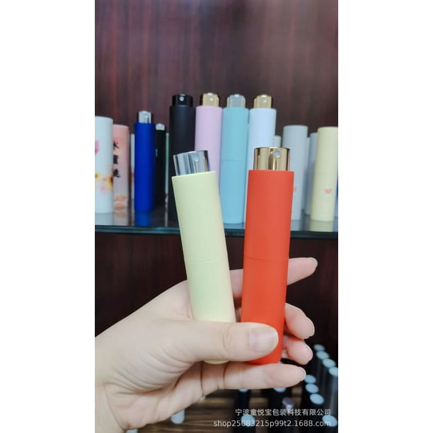 Botella rociadora de perfume giratoria telescópica con subsuperficie esmerilada colorida y elástica redonda de 10 ml