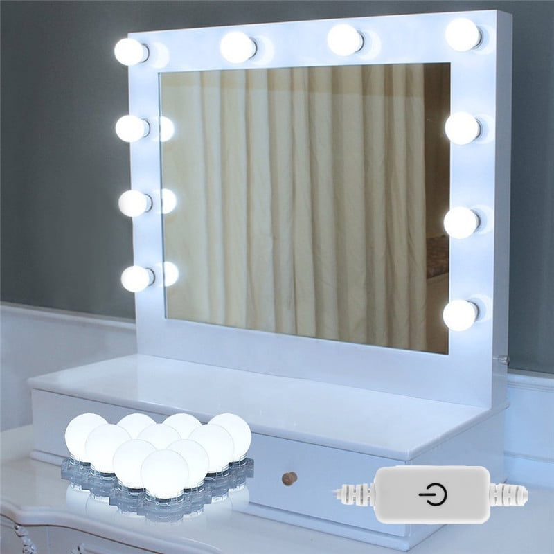 vanity table with mirror and lights