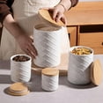 thumbnail image 6 of Ceramic Canisters Sets for Kitchen Countertop, Relief Food Storage Jar with Bamboo Lid, Stackable Container for Flour, Coffee, Pasta, Cereal, Tea, Cookies, Sugar, Spices, Pack of 4 (White), 6 of 7
