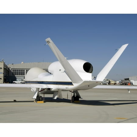 - December 3 2007 - The above-the-fuselage engine and V-tail distinguish one of two Global Hawk unmanned aircraft parked on the ramp at the Dryden Flight Research Center Poster Print